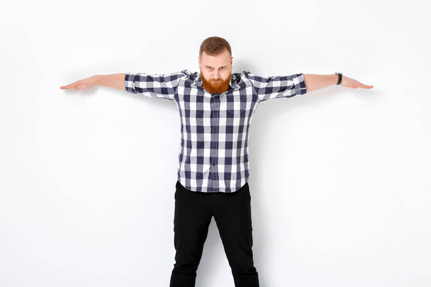 man with beard pointing copy space. - Fotó, kép