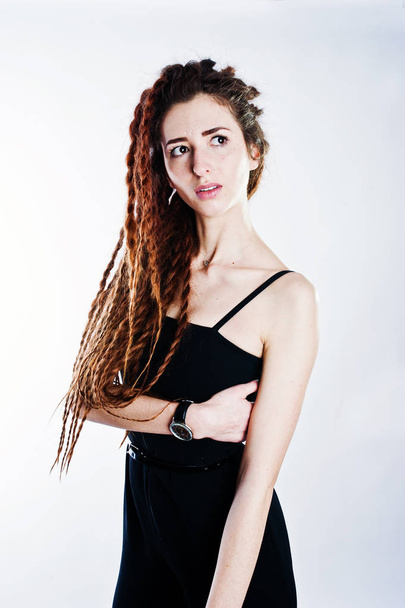 Studio shoot of girl in black with dreads on white background. - Foto, immagini
