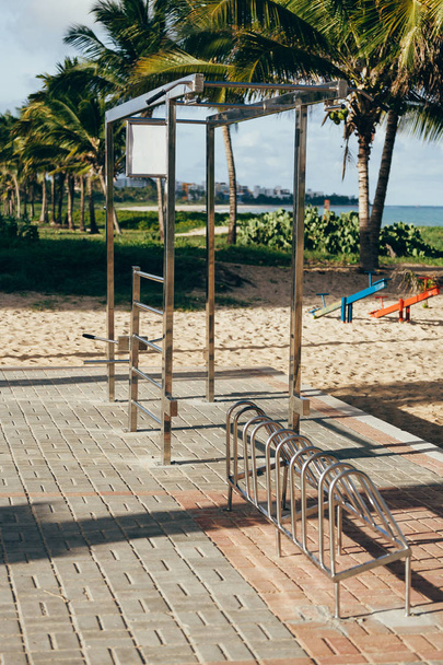 Free gym equipment at beach in Brazil. Day time image of Open gym at beach. Fitness equipment installed for public use. - Photo, image