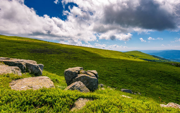 giant boulders on grassy slopes of Polonina Runa - Photo, image