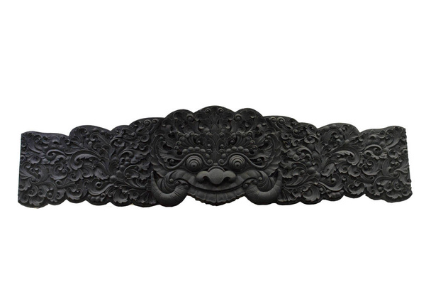 intaglio balinese in legno nero isolato su sfondo bianco
 - Foto, immagini