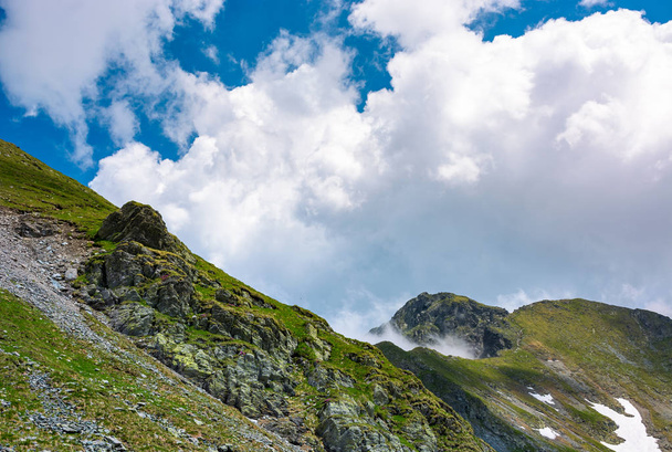 clouds over the mountain ridge - Фото, зображення
