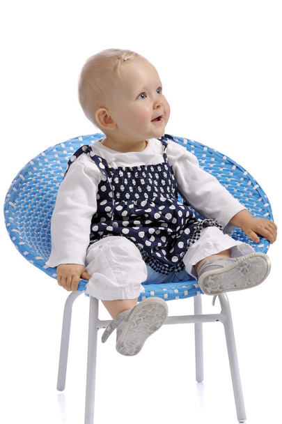 cute little baby girl sitting in a chair - Fotografie, Obrázek