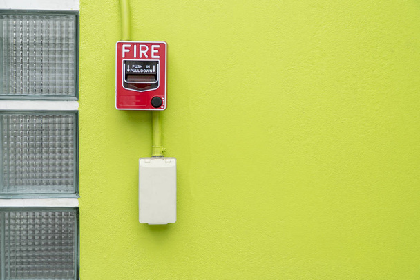 Fire alarm equipment on the green background - Photo, Image