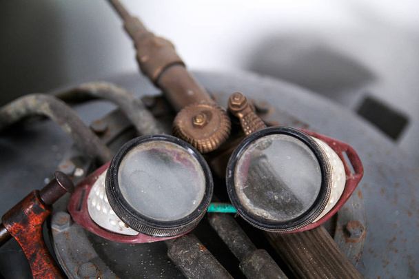Old protective goggles for welding and grinding - Photo, Image