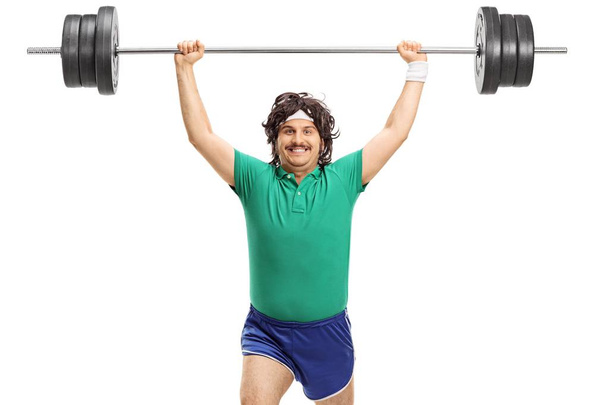 Retro sportsman lifting a barbell isolated on white background - Photo, Image