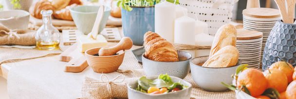 Croissant on dining table - Valokuva, kuva