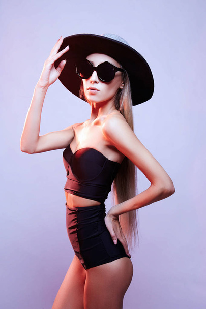 woman in hat,sunglasses and bikini - 写真・画像