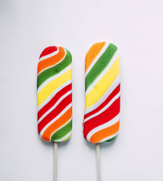 two square lollipop on white background - Foto, imagen