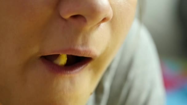 young woman eats french fries. fast and junk food concept. slow motion - Felvétel, videó