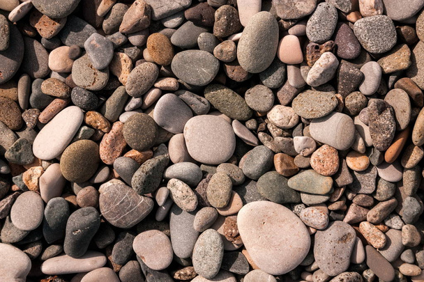 Θάλασσα πέτρες φόντο στην ηλιόλουστη μέρα - Φωτογραφία, εικόνα