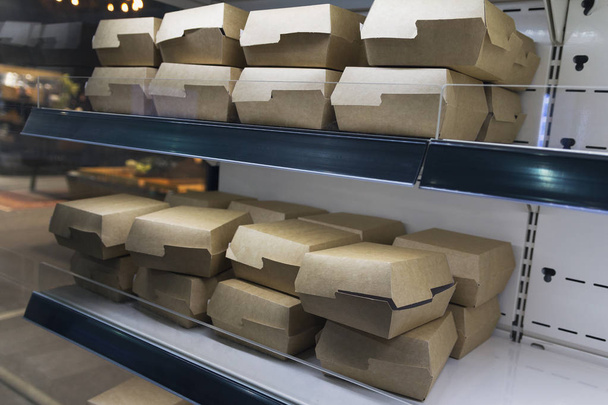 Boxes of environmental material on the counter grocery store. Sales - Photo, Image