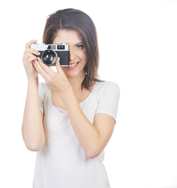 young beautiful woman photographer shot in white background - 写真・画像