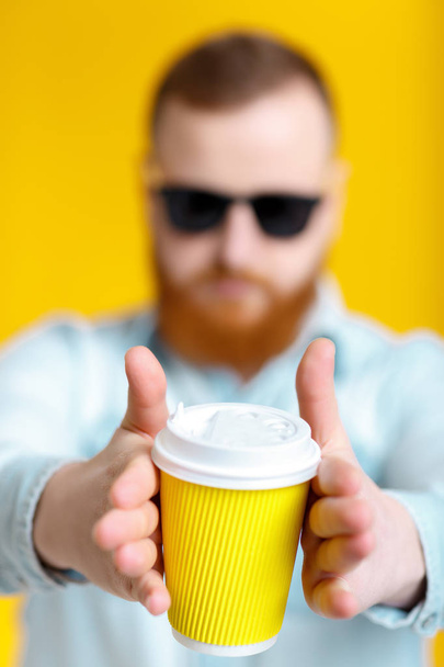red beard man holding cup with coffee - Photo, image