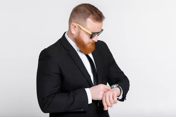 Business man looking at watch - Photo, Image