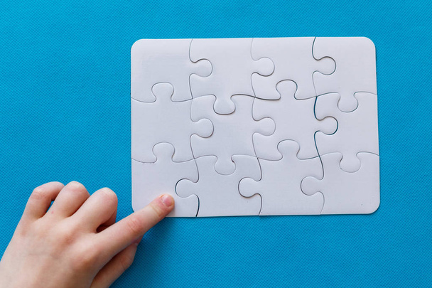 Last piece jigsaw in hand,Concept success of business. - Photo, image