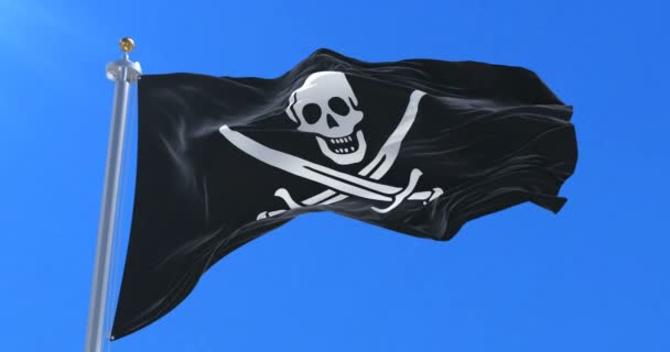 Flaga piratów macha na wiatr w powolny z błękitnego nieba, pętla - Materiał filmowy, wideo