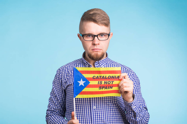 Man with pro-independence flag. Referendum For The Separation Of Catalonia From Spain Concept - Photo, Image