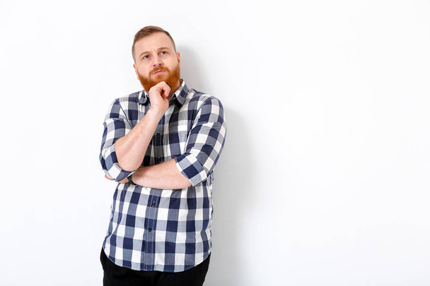 man with red hair and beard in plaid shirt - Foto, Imagem