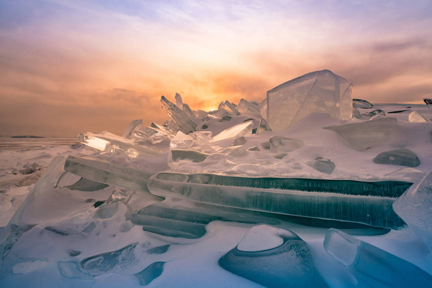 Ice crack on frozen Baikal water lake northern Siberia Russia winter season natural landscape  - Photo, Image