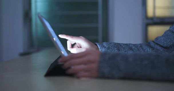 Woman using tablet computer at home  - Photo, Image