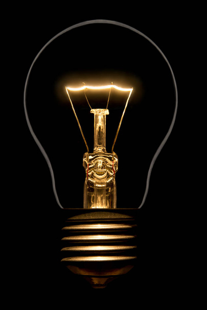 Photo of silhouette of filament bulbs on a black background - Photo, Image