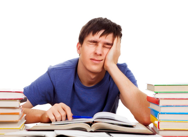 Étudiant fatigué avec un livre
 - Photo, image