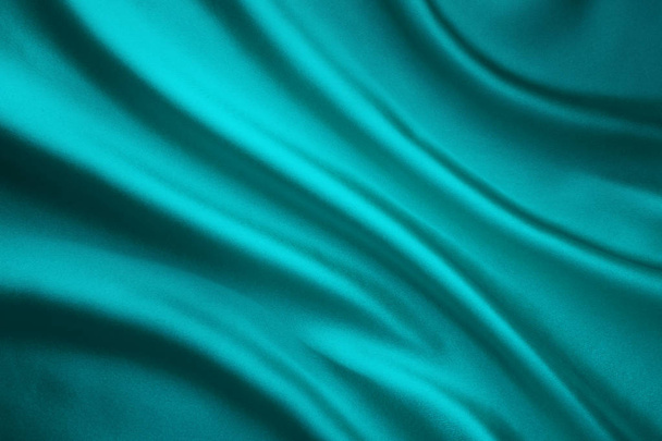 Stof zwaaien zijde achtergrond, Teal Satin verfrommeld doek, Wave vorm - Foto, afbeelding