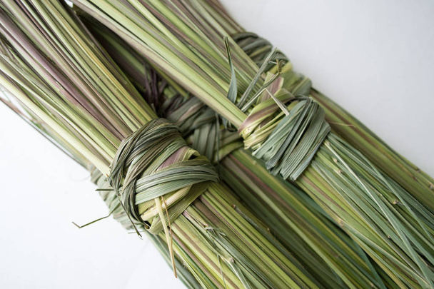 A bunch of dry green lemongrass on a white background - Photo, Image