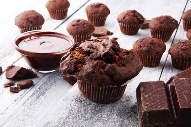Chocolate muffins, homemade bakery on white wooden background. - Photo, Image