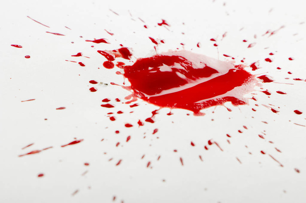 drops of red blood on white paper - Foto, imagen
