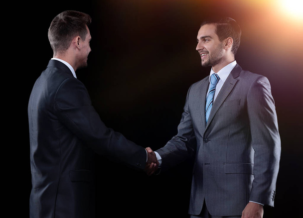 handshake business partners at the meeting - Foto, Imagen