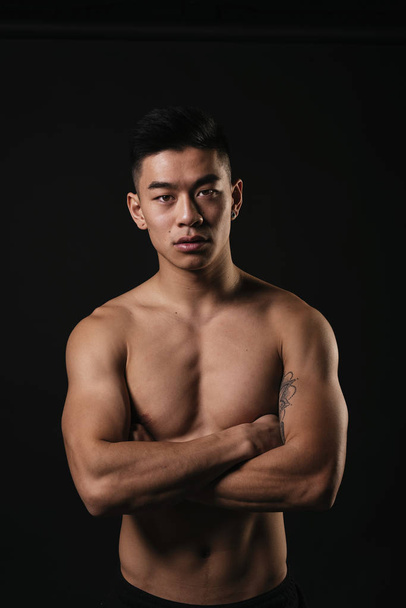 Portrait of young asian boy with fitness body. - Zdjęcie, obraz
