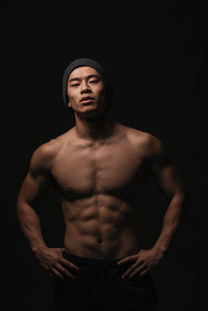Portrait of young asian boy with fitness body. - Foto, Bild