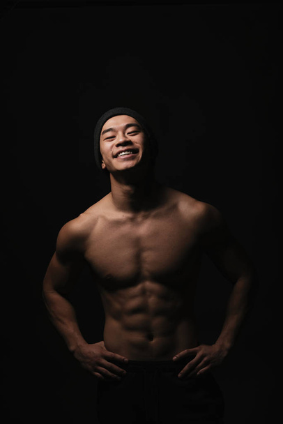 Portrait of young asian boy with fitness body. - Photo, image