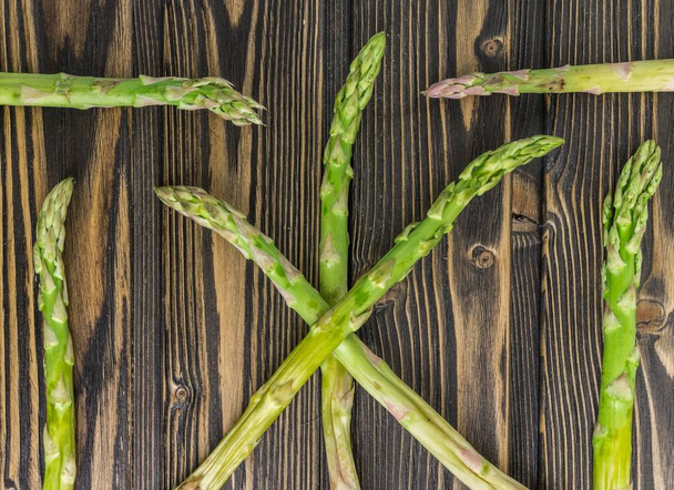 asparagus on wooden background - Фото, зображення