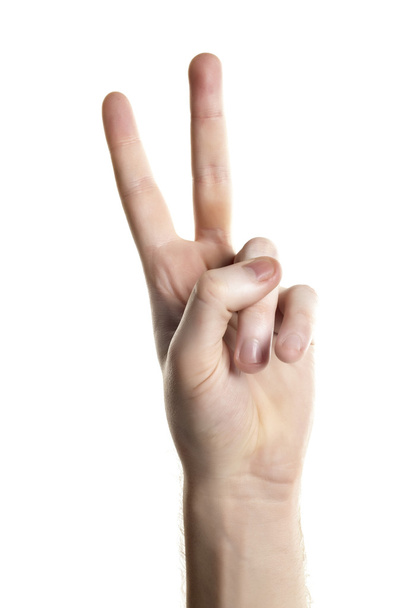 een hand gesturing vrede - Foto, afbeelding