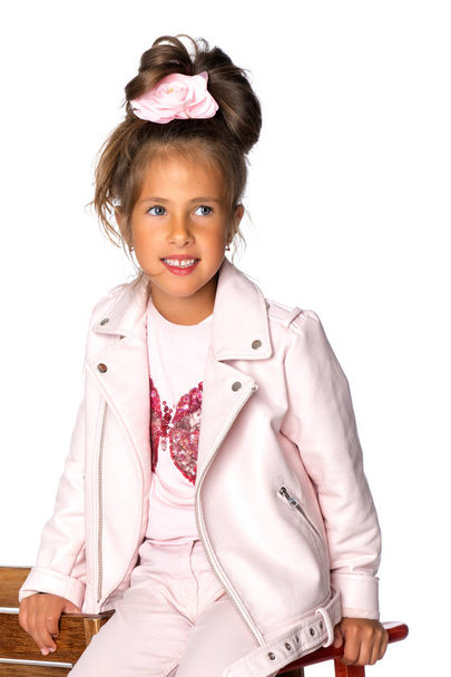 Fashionable little girl in a dress - Valokuva, kuva