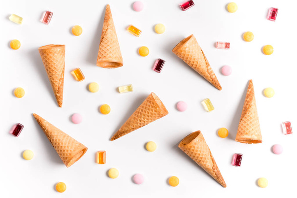 Ice cream cones and candy lay flat image wallpaper - Valokuva, kuva