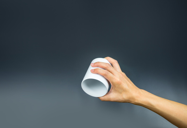 Empty coffee cup, hand holding upside down - Φωτογραφία, εικόνα