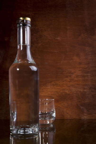 A bottle of vodka - Фото, изображение