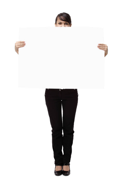 closeup.young business woman showing blank banner. - Foto, immagini