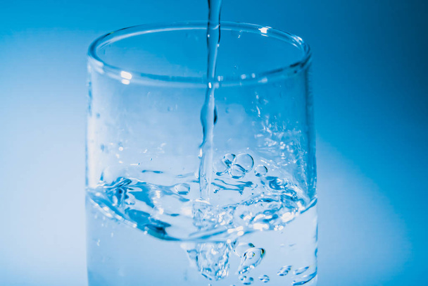 closeup glass of water, fresh and pure water, world of water day concept. - Photo, Image