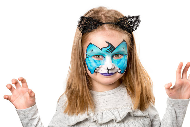 Pretty little girl with facepainting - Foto, afbeelding