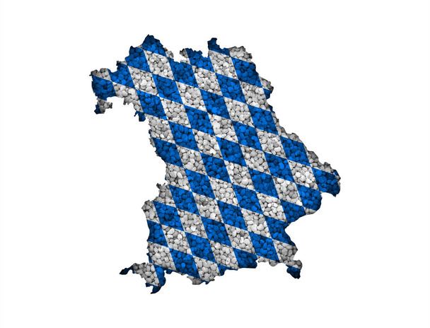 Mapa e bandeira da Baviera em sementes de papoila
 - Foto, Imagem