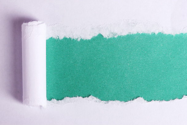 Torn paper with blue background - Фото, зображення