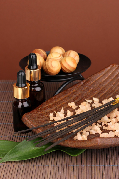 aromatherapy setting on brown background - 写真・画像
