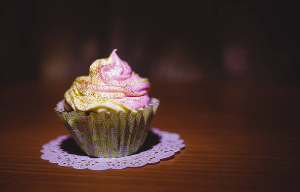 Homemade cakes of pink keksi on a dark background - Photo, Image