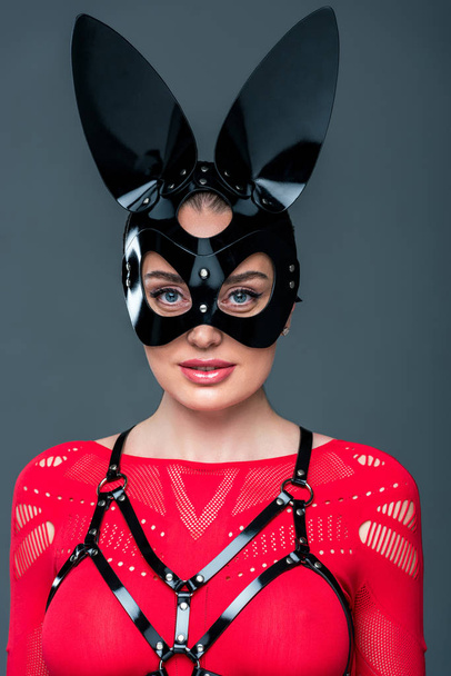 Attractive hot girl wearing bunny mask isolated on grey - Photo, Image