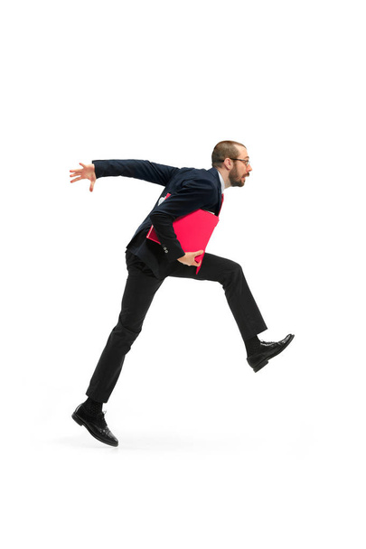 Businessman running with a folder on white background - Foto, afbeelding